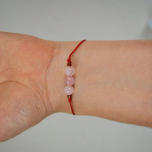 Pulsera de Cuarzo Rosa Hilo rojo 